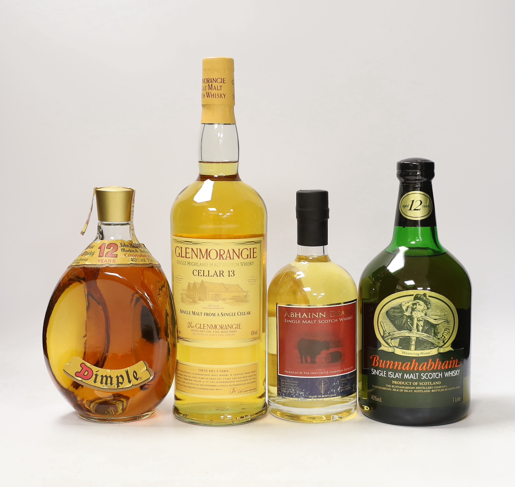 Four boxed bottles of whisky; Glenmorangie ‘Cellar 13’, Bunnahabhain, Abhainn Dearg and John Haig & Co.